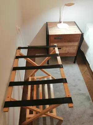 a room with a desk and a table with a lamp at 8' από Μετρό,Ντυνάν,Παίδων,Λαϊκό in Athens