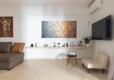 a living room with a couch and a table at Elegant Apt 50meters Close Acropolis in Athens