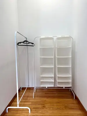an empty room with white shelves in a wall at Mosaikon Guesthouses #Miltiadou Str in Athens