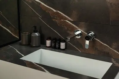 a bathroom with a white sink and a mirror at Smart-Stay Acropolis View in Athens