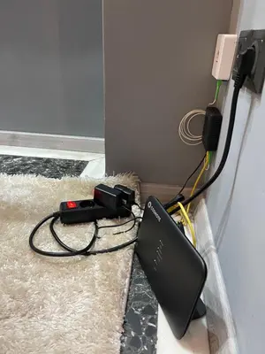 a laptop computer is hooked up to a wall at Maria's luxury apartment in Athens