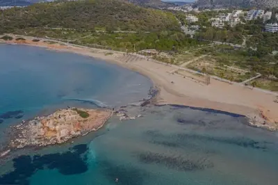 an aerial view of a beach and the ocean at Kavouri Seaside 85sqm Apartment 5' from the beach in Athens