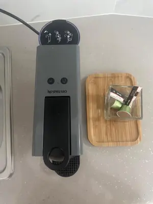 a black and gray blender sitting on a counter at FEELS LIKE HOME in Athens