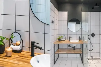 a bathroom with a sink and a mirror at Luxury Flat w/2Bath - Private Parking @Pasalimani in Piraeus