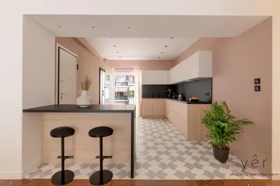 a kitchen with a counter and two stools at Luxury Flat w/2Bath - Private Parking @Pasalimani in Piraeus