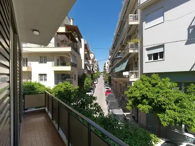 an apartment balcony with a view of a street at Stylish Sanctuary, Pangrati Gem Refurbished in Athens