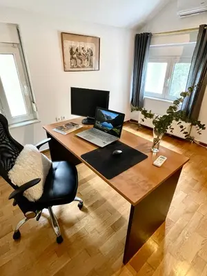 an office with a desk with a laptop and a chair at Villa Zen Kyriakos Magnificent Vibes in Paianía