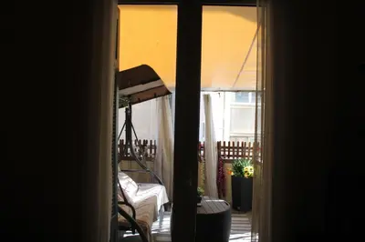 a view of a balcony from a room with a window at ATHENS CITY THEMIS 4 in Athens