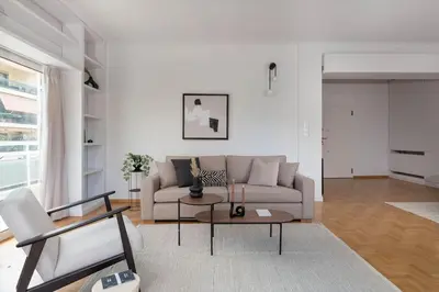 a living room with a couch and a table at Luminous 3BR Apartment in Cholargos by UPSTREET in Athens