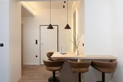 a kitchen and dining room with a table and chairs at Athens City Modern Apartments in Athens