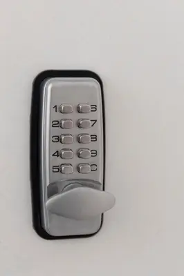 a remote control sitting on top of a table at Ati-Key Residence in Athens