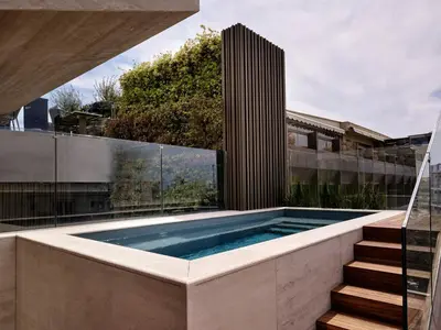 a swimming pool on the roof of a house at Anthology of Athens, The Leading Hotels of the World in Athens
