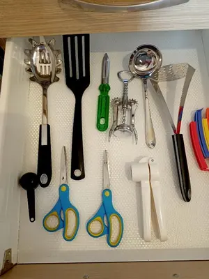 a group of kitchen utensils sitting on a shelf at Myilios Leisure Piraeus by Ilios Company in Piraeus