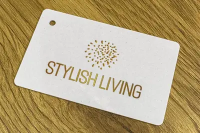 a white card with the word switching on a table at Stylish Living-Ioli in Athens