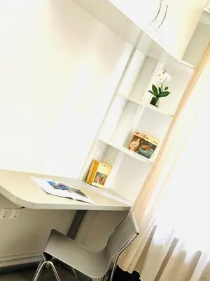 a desk and a chair in a room at Modern home in Athens