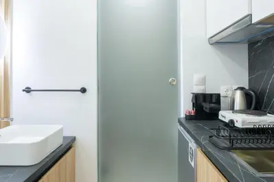 a kitchen with a sink and a counter top at Stylish Living-Ariadne in Athens