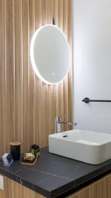 a bathroom with a sink and a mirror on a counter at Stylish Living-Ariadne in Athens