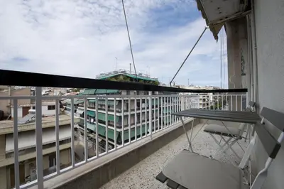 a balcony with a view of a building at Alemar Quiet Kallithea Retreat with AC, Wifi in Athens