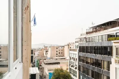 a view of a city from a building at Dema Luxury Suites - Perikleous E4 in Athens
