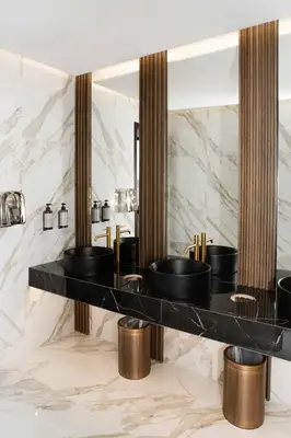 a bathroom with two sinks and a mirror at Luwian Athens Boutique Hotel in Athens