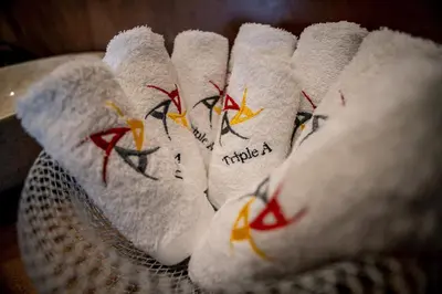 a group of white socks with writing on them at Triple A - Chic & Elegant by the Market - FREE parking! in Athens