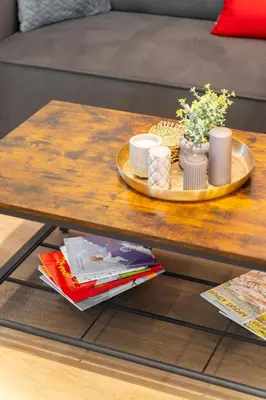 a coffee table with a plate on top of it at Alkis Luxury By Greece Apartments in Athens