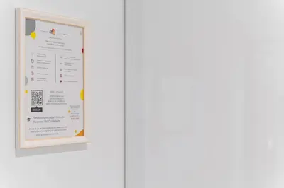 a white board on a white wall with a picture at Alkis Luxury By Greece Apartments in Athens