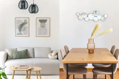 a living room with a couch and a table at Sunny 2BR Apartment in Nea Smyrni by UPSTREET in Athens