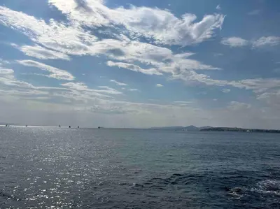a large body of water with a cloudy sky at Luxury Modern 2 bed Elegance in Athens