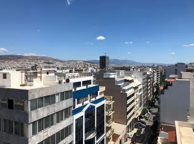 an aerial view of a city with buildings at Port Twins Suites No2 in Piraeus