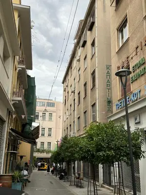 a city street with buildings and a street light at Parthenon View Apartment in Athens