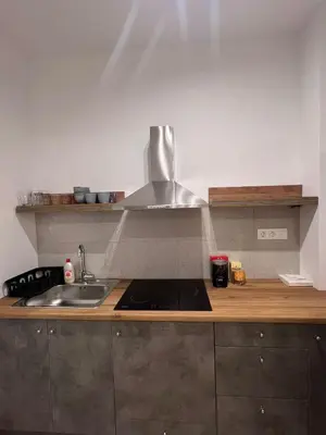 a kitchen with a sink and a counter top at 2BDR q in Athens
