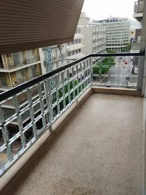 a balcony with a view of a city at Комната с общей баней karolou 10 in Athens