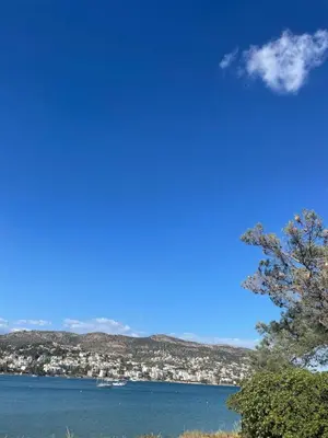 a view of the ocean and a city at Seaside Argo apartment in Porto Rafti