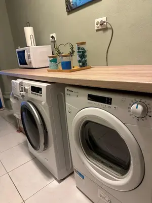 a washing machine with a counter on top of it at Athena Cocooning Apartment in Piraeus