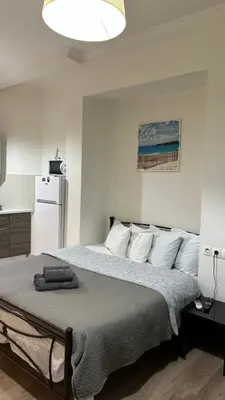 a bedroom with a large bed with white pillows at Apartment in Athens centre in Athens