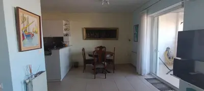 a kitchen and dining room with a table and chairs at Cozy Room with Sea View in Athens