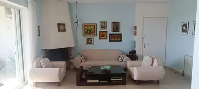 a living room with a couch and two chairs at Cozy Room with Sea View in Athens