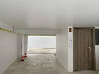 a hallway with a door in a room with the ocean at Walk into Dream of Acropolis 10 in Athens