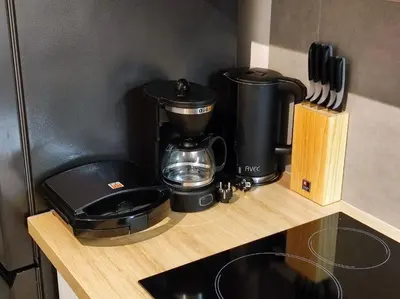 a coffee maker sitting on top of a counter at Studio Stratos ideal for 2-3 night Weekends in Athens