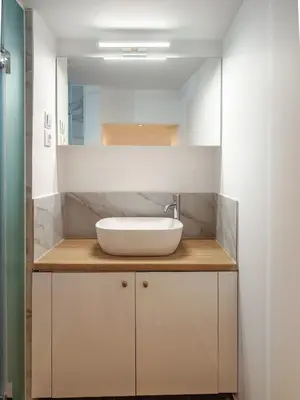 a bathroom with a sink and a mirror at Zen Garden, 600m from Acropolis Museum in Athens