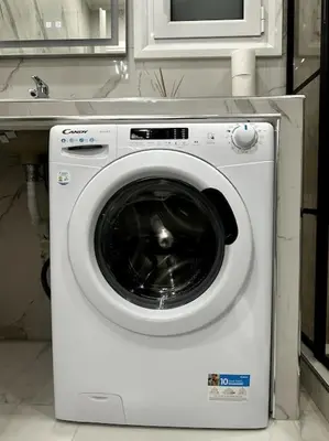 a washing machine in a kitchen next to a sink at Cozy Elegant Apartment #2 VIPGreece in Athens