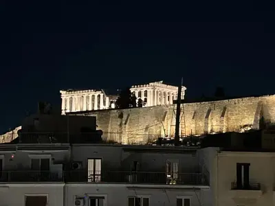 a view of the acropolis at night at Acropolis Compass Residence in Athens