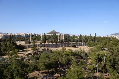 an aerial view of a park with trees and buildings at Acropolis Compass Residence in Athens