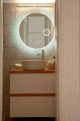 a bathroom with a sink and a mirror at Raise Varkiza Serenity Suite in Vari
