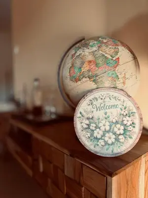 a globe sitting on top of a wooden table at Filoxenia Harmony Retreat in Keratea