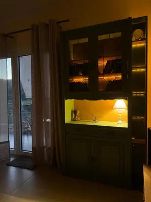 a kitchen with a sink and a cabinet with a lamp at Filoxenia Harmony Retreat in Keratea