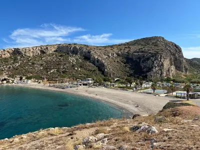 a view of a beach with a mountain in the background at Filoxenia Harmony Retreat in Keratea