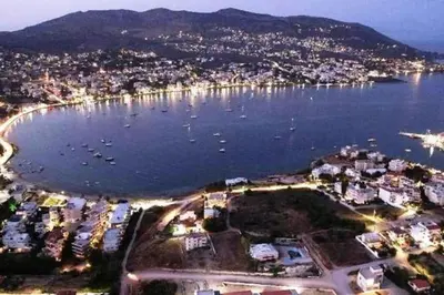 an aerial view of a harbor with boats in the water at Porto - luxury penthouse, pool, walk to the beach in Porto Rafti
