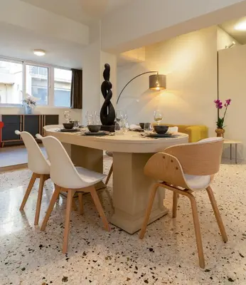 a dining room with a table and chairs at Happy Loft Athens in Athens